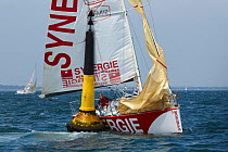 Isabelle Joschke on "Synergie", too close to a northern cardinal mark during the Quiberon Solo. Port Haliguen, Quiberon, France. June 2010.