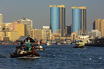 Passenger ferries crossing Dubai harbour, United Arab Emirates, February 2007