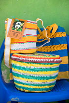 Mochilas and other products woven from recycled plastic bags.  This project has recycled more than 1.5 million plastic bags and provides an income to the village living around the forest thereby prot...