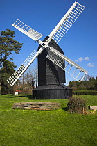 High Salvington windmill a black post mill built before 1750, and ceasing work by 1900, restored to full working order and grinding flour, High Salvington, Sussex, England, UK. March 2009