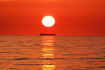 Tanker at sunrise on the North Sea, May 2010.
