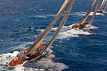 Three classic yachts racing at the Panerai Antigua Classic Yacht Regatta, Caribbean, April 2010.