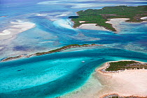 Aerial view of the Exumas, with a lone yacht. Bahamas, Caribbean, June 2009.