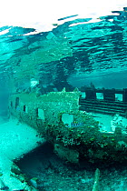 Plane wreck that has formed an artificial reef in the Exumas, Bahamas, Caribbean. June 2009.