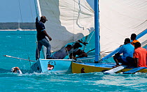 Clash between boats during the Bahamian Sloop regatta, Georgetown, Exumas, Bahamas. April 2009.