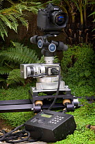 Nikon CD100 camera and digital pan head, on track for use in timelapse photography.
