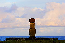 Silhouette of Moai statue at dawn in Ahu Ko Te Riku, restored archaeological site of Ahu Tahai, Hanga Roa, Easter Island, Pacific ocean, November 2004