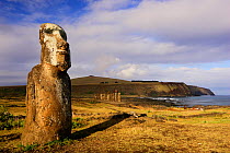 Giant moai statue in Ahu Tongariki with Poike Peninsula in the background, Easter Island, Pacific ocean, November 2004