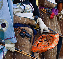 Details of the traditional costume, hat, sword, bow and arrows from samurais (warriors) from the Takeda School of Horseback Archery, during the training prior to a Yabusame (Japanese mounted archery),...