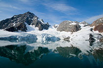 View of the Hornbreen glacier with reflections, in Hornsund, southern Svalbard Archipelago, Norway. July 2009