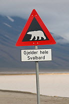 Caution sign warning of the danger of Polar bears in the area, Longyearbyen, Isfjorden, Svalbard Archipelago, Norway