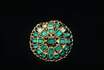 Emerald brooch recovered from the shipwreck "Las Maravillas", a Spanish galleon sunk in 1658, Bahamas. 1987.
