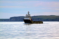 Oil rig supply vessel "Porto Salvo" leaving Peterhead, Scotland, June 2010.
