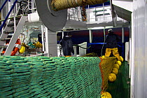 Paying out the trawl net over the stern of a North Sea trawler, June 2010.