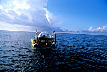 DeepSee diving submersible at water's surface, being towed, Cocos Island, Costa Rica, Pacific Ocean. Property released Model released.