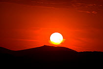 Sun setting over the Morena Mountain range, Jaen, Spain, June 2009, sequence 1/2