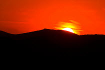 Sun setting over the Morena Mountain range, Jaen, Spain, June 2009, sequence 2/2
