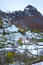 Village church in winter landscape, Valle del Lago, Somiedo NP, Asturias, Northern Spain, November 2009