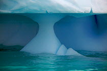 Iceberg showing wave erosion, Antarctica, January