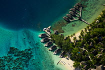 Aerial view of tourist lodges on Bora Bora Island, Society Islands, French Polynesia. July 2006