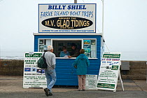 Ticket booth selling tickets for a boat trip to visit the Farne Islands, Seahouses, Northumberland, UK, June 2008