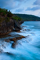 Waves crashing against rocky coastline at Martin Point, West coast of Christmas Island National Park, Indian Ocean, Australian Territory, November 2009.