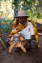 Member of the Durrell Conservation Trust taking care of Ploughshare / Angonoka tortoise (Geochelone yniphora) one of the most endangered turtles in the world, Baie de Baly National Park, North west Ma...
