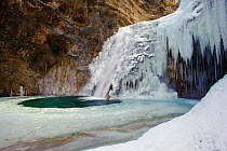 Water from the Arazas river frozen in winter, Ordesa Valley, Ordesa National Park, Pyrenees, Huesca, Aragón, Spain, March 2010