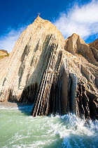 Zumaia beach with vertical rock striations, Basque Coast, San Sebastian, Northern Spain, April 2010.