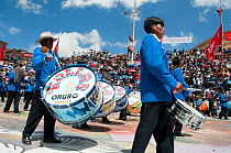Band performing at the Oruro Carnival, the biggest annual cultural event in Bolivia, with Morenada music and dancing originating from the Bolivian Andes, Bolivia, South America, February 2009.
