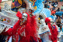 Parade performance at the Oruro Carnival, the biggest annual cultural event in Bolivia, with Morenada music and dancing originating from the Bolivian Andes, Bolivia, South America, February 2009.