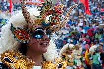 Oruro Carnival, portrait of dancer wearing ornamental costumes used in the performance traditional 'Diablada' dances. This is the biggest annual cultural event in Bolivia, with Morenada music and danc...