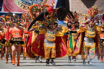 Oruro Carnival, dancers wearing ornamental costumes used in the performance traditional 'Diablada' dances. This is the biggest annual cultural event in Bolivia, with Morenada music and dancing origina...