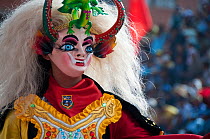 Oruro Carnival, portrait of masked dancer wearing ornamental costumes used in the performance traditional 'Diablada' dances. This is the biggest annual cultural event in Bolivia, with Morenada music a...