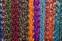 Handmade beaded necklaces for sale in a large famous Indian market in the town of Otavalo, Equador.