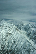 Aerial view of K2 and glaciated valley, Concordia, Karakoram Mountains, Himalayas, Pakistan. From Pakistani military helicopter for BBC series Planet Earth 2005