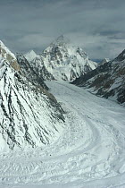 Aerial view of K2 and glaciated valley, Concordia, Karakoram Mountains, Himalayas, Pakistan. From Pakistani military helicopter for BBC series Planet Earth April 2005