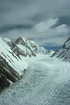 Aerial view of K2 and glaciated valley of Concordia, Karakoram Mountains, Himalayas, Pakistan. From Pakistani military helicopter for BBC series Planet Earth April 2005