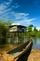 Boat used for filming, on the River Fly,  Papua New Guinea. Filming for BBC Planet Earth, Jungles episode, 2005
