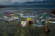 Plastic bottles and other pollutants floating on the surface, Lake of Geneva, France. March 2008.