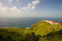 View of coastline and school buildings, The Bottom, Saba Island in the Dutch Caribbean, Netherlands Antilles, West Indies. August 2006.