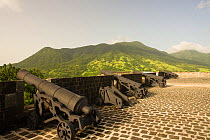 Line of cannons, at Brimstone Hill Fortress on the island of St. Kitts, Dutch Caribbean, Netherlands Antilles, West Indies. August 2006.