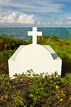 Beachside cemetery in Blue Hills, Provodenciales, Turks and Caicos, Caribbean. June 2007.