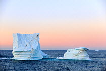 Iceberg at sunset in Davis Strait, off south Baffin island, Nunavut, Canada,  August 2010
