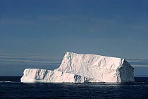 Iceberg floating at an angle, in Davis Strait off south Baffin island, Nunavut, Canada,  August 2010