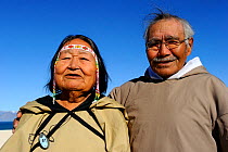 Portrait of elderly Inuit couple, Pond Inlet village, Baffin Island, Nunavut, Canada, August 2010