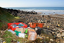 Collection of rubbish on Porth Ysgo beach, Gwynedd, North Wales, UK April 2010.