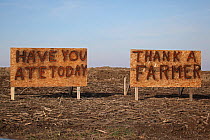 Sign on farm 'Have you ate today - thank a farmer' Upstate New York, USA. January 2000