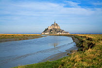 Mont Saint Michel at low tide with the Couesnon River in the foreground, Normandy, France, January 2008
