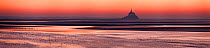 Sunset over the Mont Saint Michel bay, Normandy, France. digital composite.
